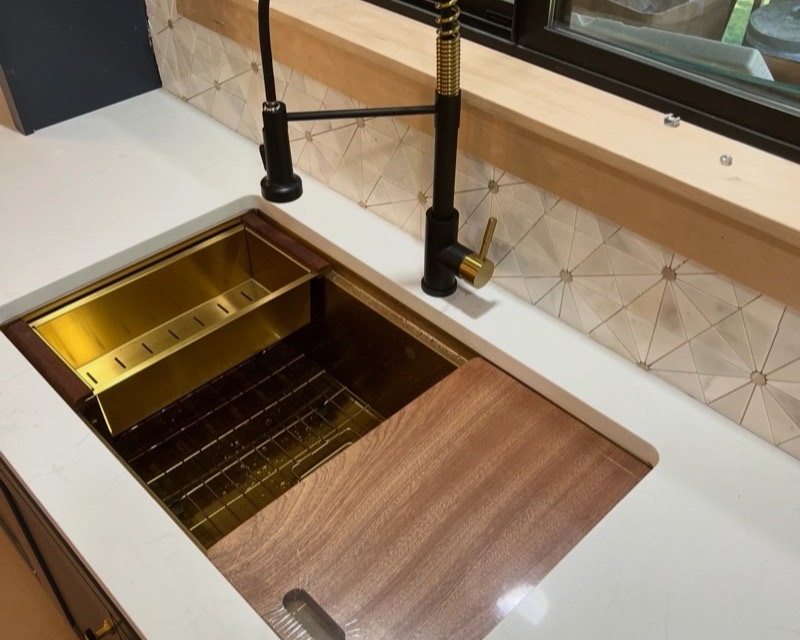 Kitchen fixtures — custom undermount sink and gooseneck faucet in Poulsbo